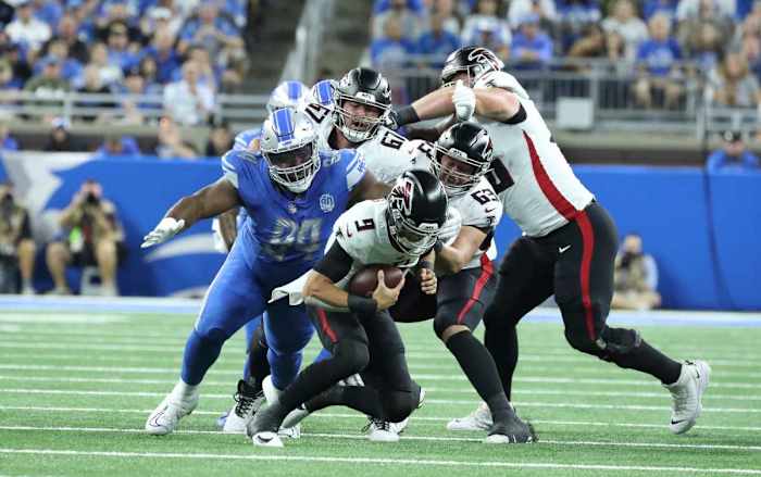 Atlanta Falcons quarterback Desmond Ridder sacked by the Detroit Lions defense.